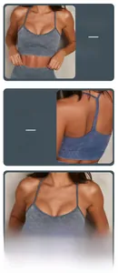 Detail view of acid wash yoga bra with cross back straps and ribbed hem in blue grey