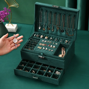 Three-layer vintage velvet jewelry organizer box in dark green with multi-compartments