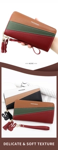 Detail of color-block long zip wallet with lychee texture and metal tassel strap