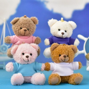 Detailed group view of four colorful plush teddy bear keychain pendants for gift sets