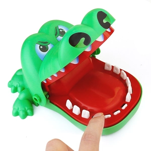 Classic green crocodile biting finger game toy made of plastic for kids' prank fun