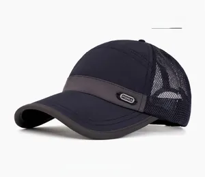 Detail view of navy blue quick-dry baseball cap with breathable mesh and logo plaque