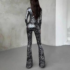 Retro disco silver leopard print long sleeve jumpsuit with flared legs and slim fit