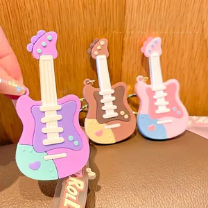 3D cartoon guitar keychain with Rock & Roll silicone strap in vibrant colors