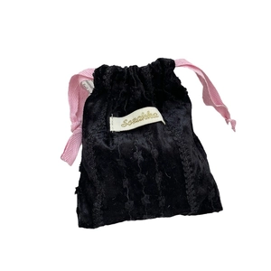 Black velvet drawstring storage bag with pink cords and Sozakka label on white background