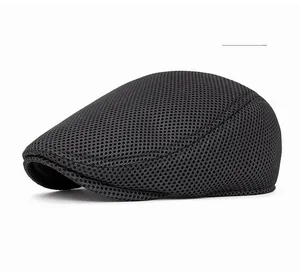 Close-up of breathable mesh fabric and detailed stitching on the grey duckbill cap
