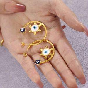 18K gold plated stainless steel C-shaped hoop earrings with blue enamel evil eye motif