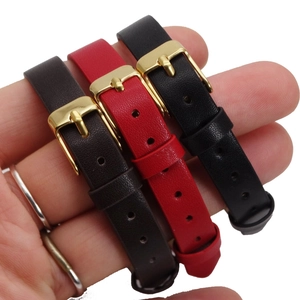 Handheld 10mm wide leather strap bracelets in brown, red, and black with golden buckles
