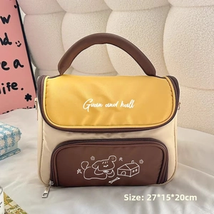 Macro detail of tricolor patchwork makeup bag with cute cartoon dog and dimensions 27x15x20cm