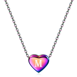 Rainbow stainless steel heart necklace with letter M pendant on a white background