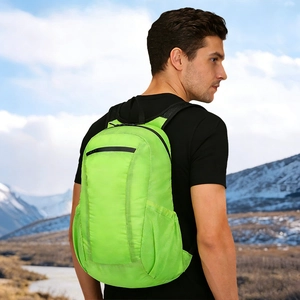 Lightweight neon green waterproof folding backpack for hiking and outdoor activities