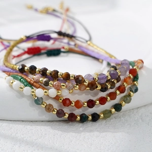 Handmade bohemian multilayered natural semi-precious stone beaded bracelet set with gold spacers