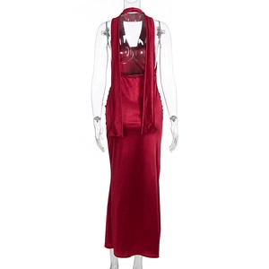 Detailed back view of burgundy satin backless maxi dress with long ribbon streamers