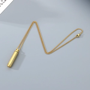 Golden cylindrical stainless steel memorial necklace with a refillable pendant for men