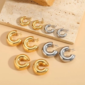 Polished titanium steel chunky C-hoop earrings in gold and silver finish options