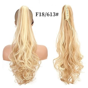 Macro detail of F18/613 blonde wavy ponytail extension with claw clip attachment