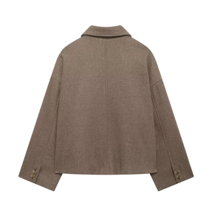 Rear view of brown wool jacket with oversized silhouette and button cuff details