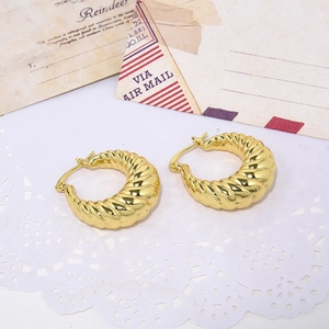 Bohemian gold twisted rope chunky hoop earrings with a glossy metal finish and U-shape design