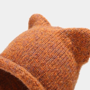 Caramel knit cat ear beanie for winter warmth with thick woven texture and cute design