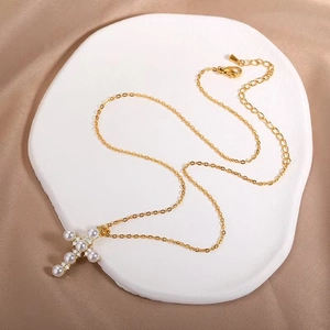 Golden titanium steel cross necklace with white pearls and sparkling crystals