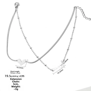 Detail of silver double-layer anklet with love pendant and heart charm in 304 stainless steel