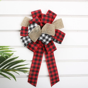 Large Christmas bow with red and black buffalo plaid and burlap for rustic holiday decor