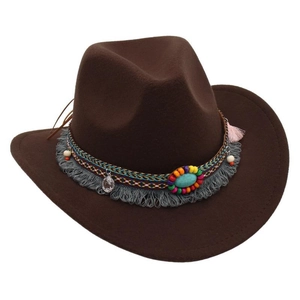 Close-up of brown felt cowboy hat featuring ethnic beads, turquoise stones and grey fringe