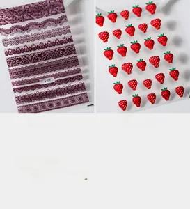 Detail of ultra-thin 3D nail art stickers featuring lace patterns and strawberry designs