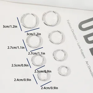 Size comparison of gold hoop earrings with S925 hallmarks ranging from 2.4cm to 3cm