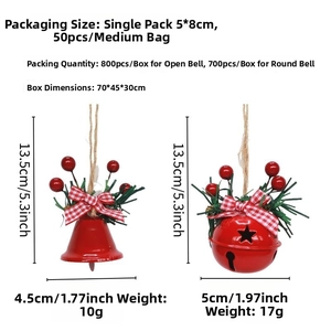 Detailed view of red Christmas bells with pine needles, berries and rustic twine hangers
