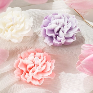 Handmade carnation soy wax scented candles in white, purple and pink for Mother's Day