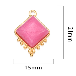 Pendentif vintage français avec pierre rose et bords dorés avec dimensions indiquées