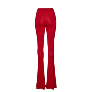 Rear view of high-waisted red bell-bottom pants showing elastic waist and slim fit