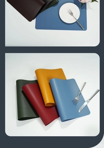 Group of colorful rolled PU leather placemats showing soft texture and flexibility