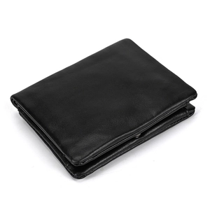 Detailed view of genuine leather bifold wallet with premium polished oil finish and grain