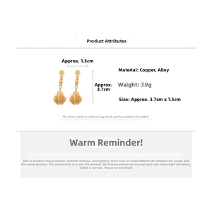 Detail of gold hollow lantern drop earrings with dimensions of 3.7cm and silver needle studs