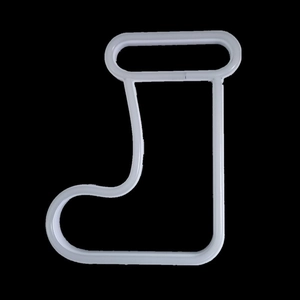 Detailed view of the Christmas stocking neon sign with a white frame on dark background