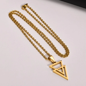 Detailed view of a gold-plated stainless steel chain with double triangle pendant for men