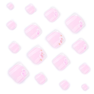 Pink and white floral press-on toenails with elegant 3D pearls and French tip design