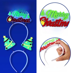 Detail of Christmas tree headband showing UV glow effect and durable felt material