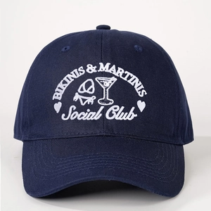 Navy blue baseball cap with Bikinis and Martinis Social Club embroidery and curved brim