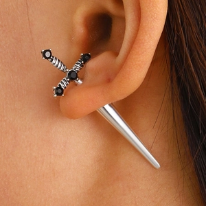 Gothic silver sword earrings with black crystal inlay on a minimalist punk dagger design