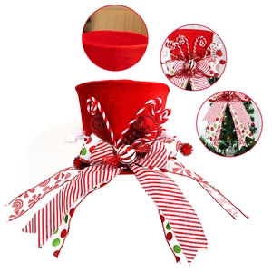Red velvet Christmas tree topper hat with candy canes and bow decoration on white background