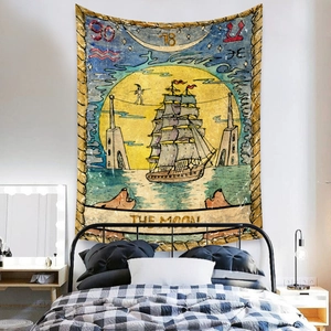 Detail of Bohemian Moon tarot tapestry featuring vintage astrology patterns on a bedroom wall