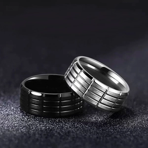 Mens stainless steel ring set in matte black and silver featuring geometric matrix grooves