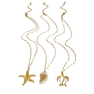 18K gold plated stainless steel ocean necklaces featuring starfish, conch, and turtle charms