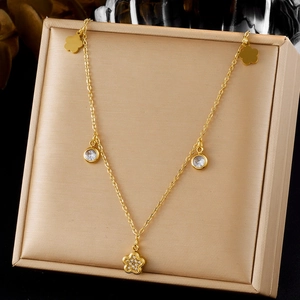 Elegant gold plated stainless steel necklace with floral diamond pendant on silk