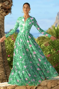 Detail of tropical green palm print surfing dress with long sleeves and front zipper