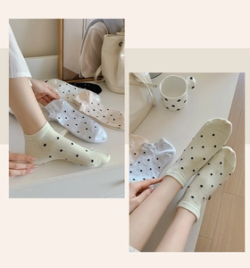 Polka dot invisible boat socks for women in various pastel colors and cotton knit fabric