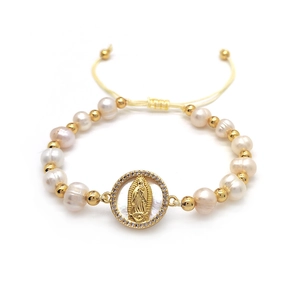 Layered natural pearl bracelet with Virgin Mary medallion and gold beads on white background